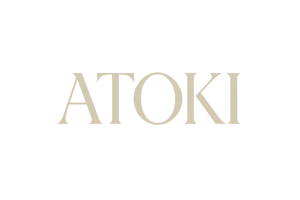 ATOKI logo in beige without background